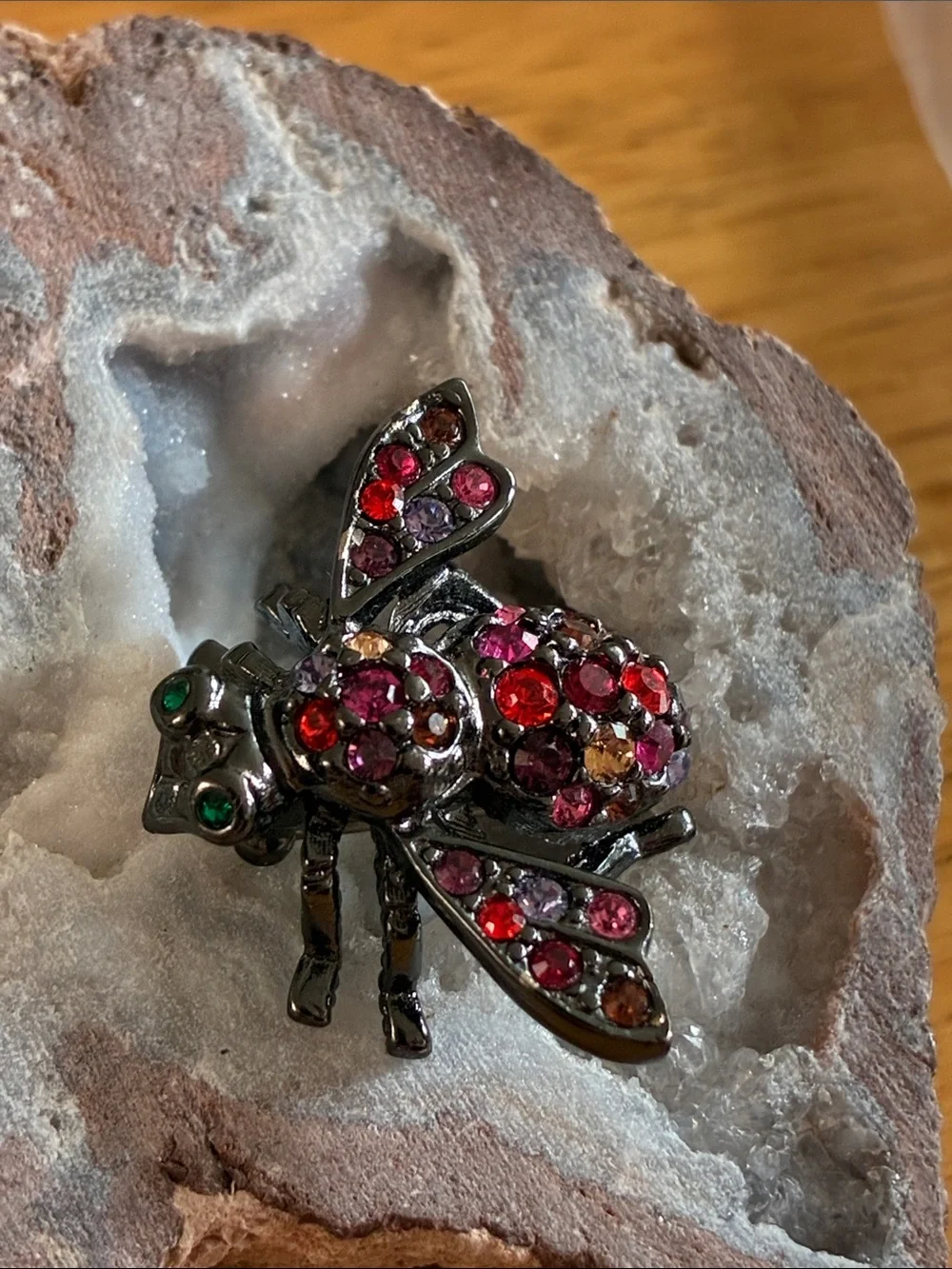 Joan Rivers red and pink rhinestone bee brooch in Japaned metal tone